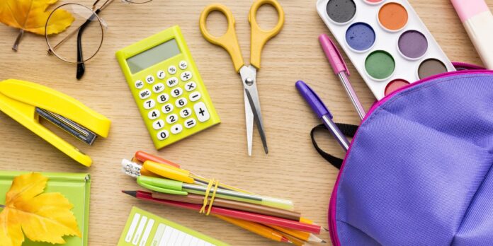 top-view-back-school-supplies-with-pencils-backpack